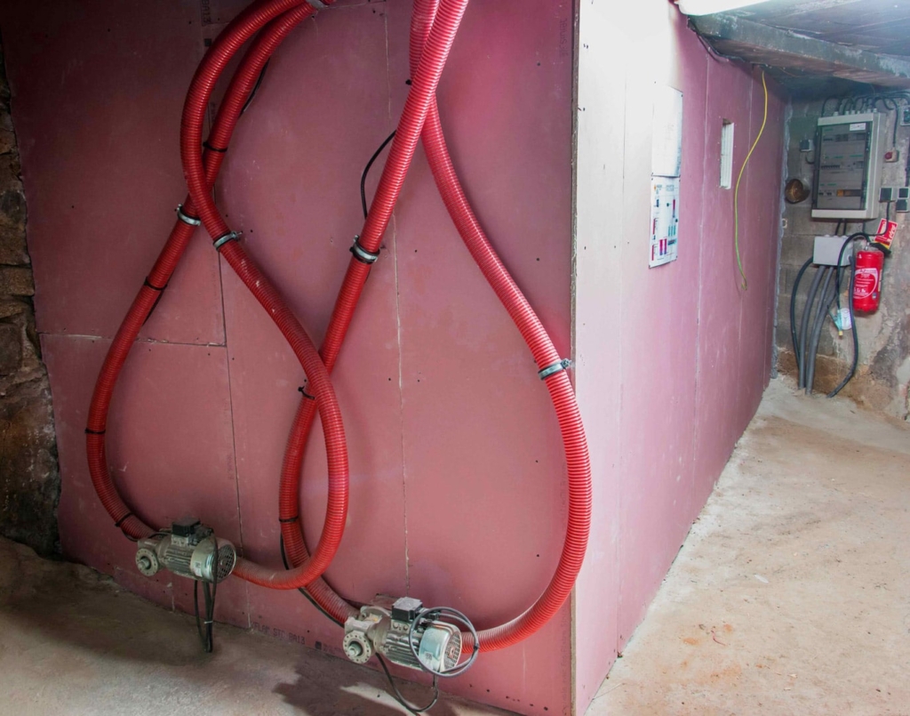 Silo à pellets avec double systèmes d'extraction RAS