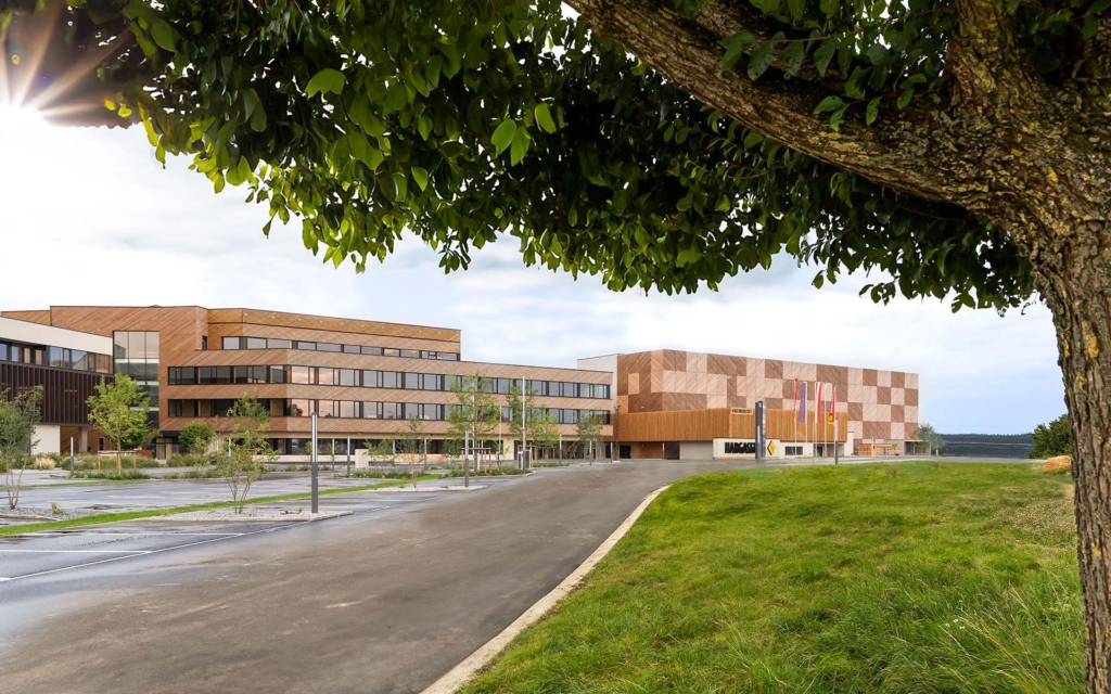 Exterior view of the new service centre, wooden car park and children's workshop