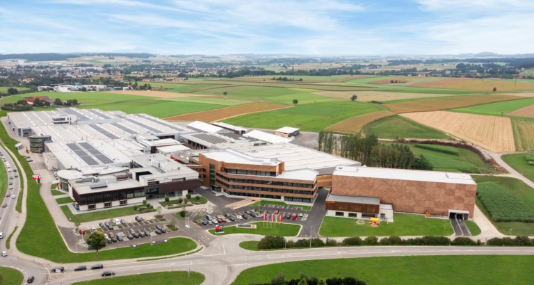 Entire Hargassner company building with timber car park - as of October 2024