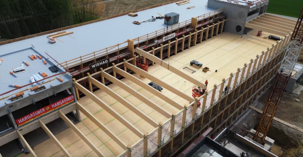 Construction progress of the wooden parking garage from above | Hargassner Holzparkhaus