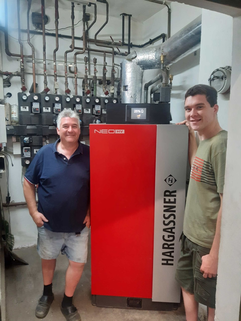 Owner of the Pagler winery with new log wood heating | Reference Hargassner