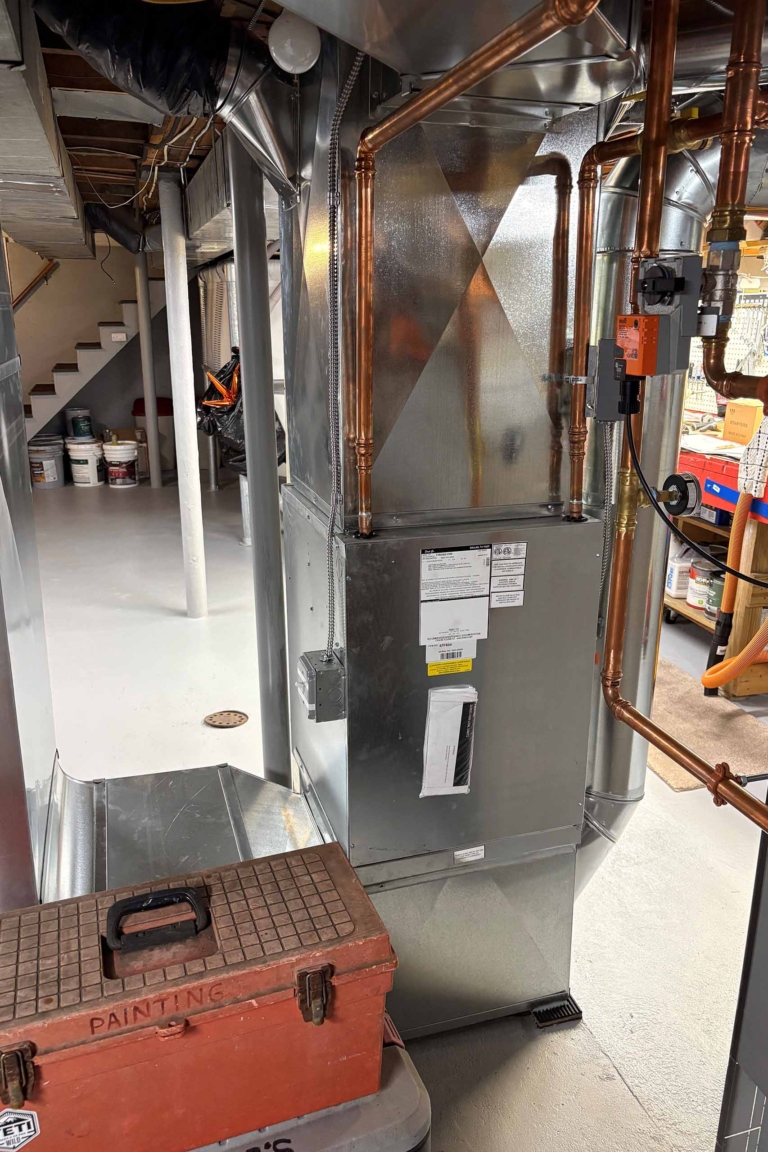 Mechanical room in the basement with air duct system