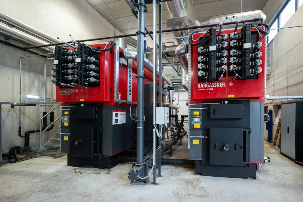 View of the Magno-SR industrial boilers in cascade configuration, Hochfügen local heating scheme | Hargassner case study
