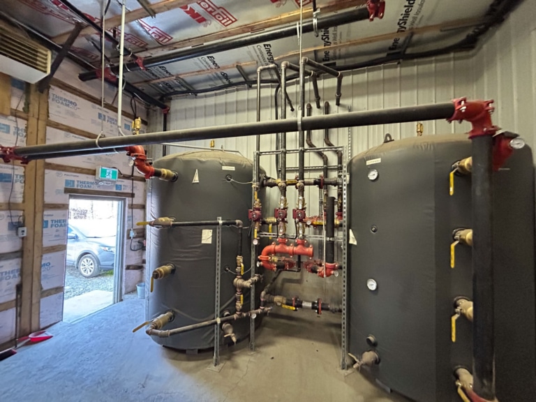 Accumulator tanks at Menuiserie D'East Angus in Quebec, Reference wood chip boiler Eco-HK 330
