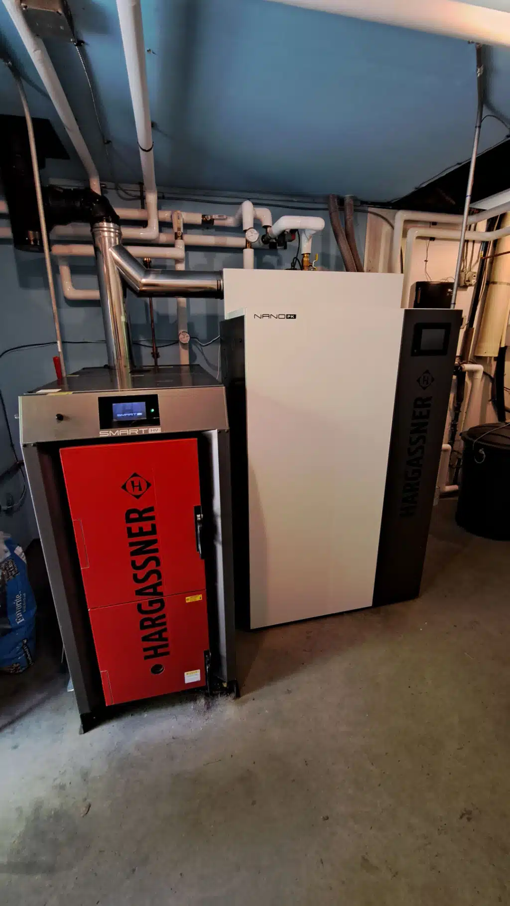 Wood log boiler Smart-HV and pellet boiler Nano-PK, Richardson family, New Hampshire - Reference combi