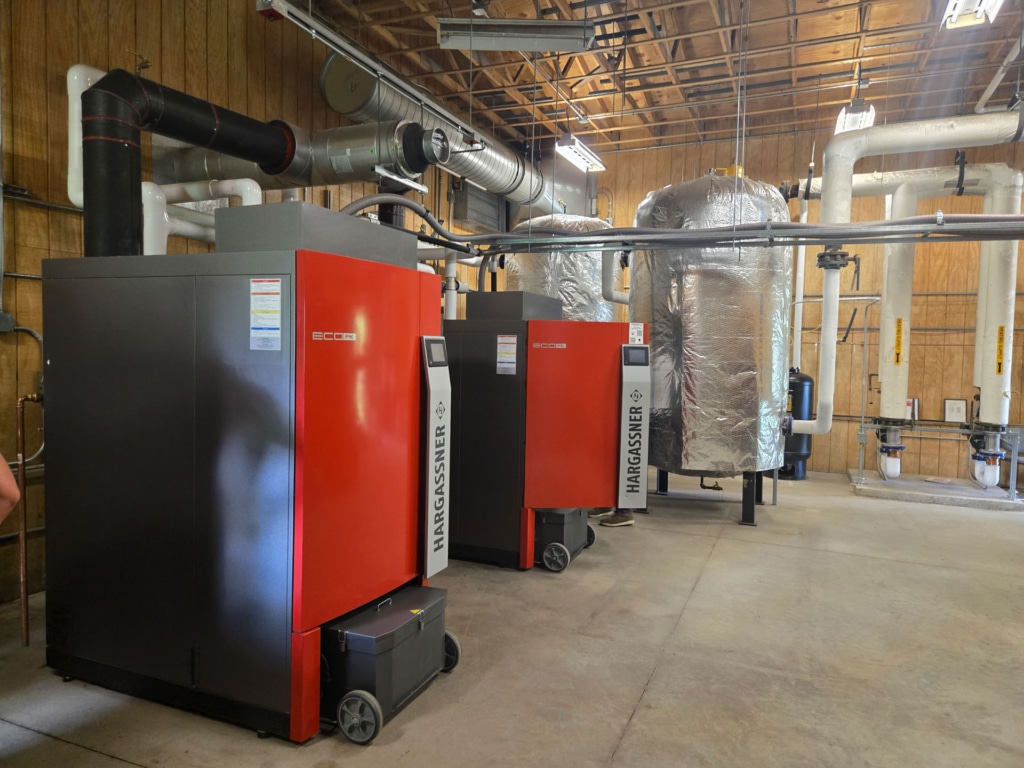 Interior view of boiler house with two pellet boilers Eco-PK, Richford High School, Vermont