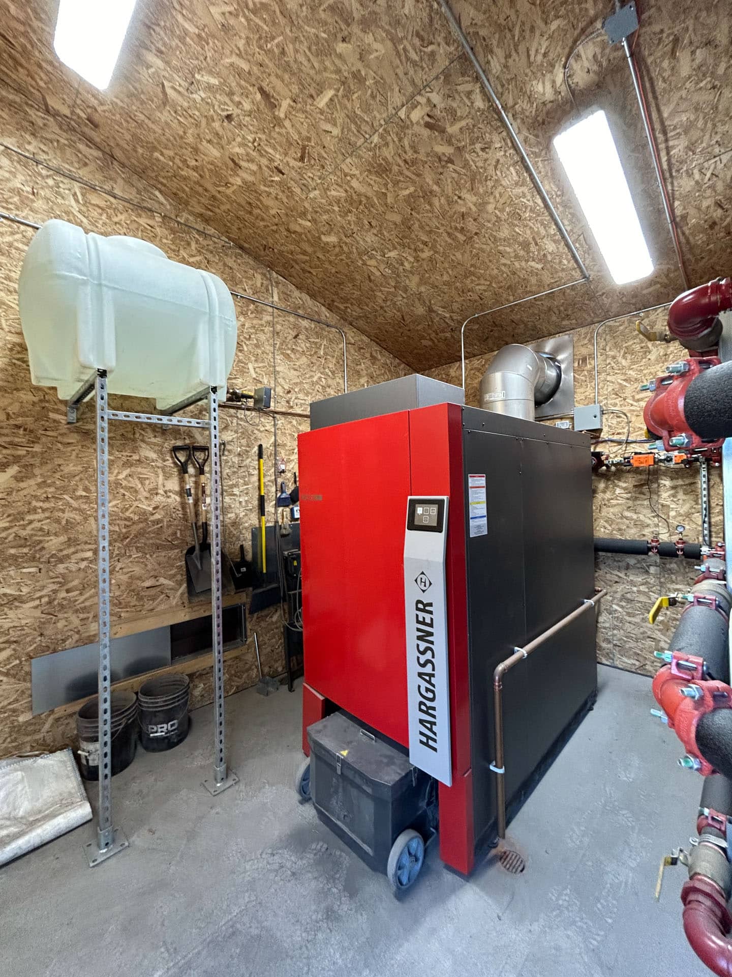 Wood chip boiler Eco-HK for Caron et Fils, producer of industrial heat exchangers, Quebec - Reference